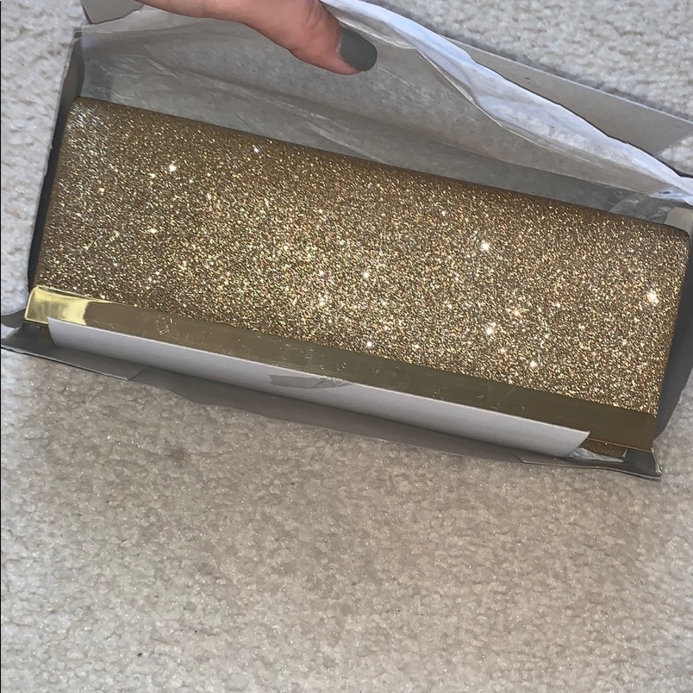 Gold sparkly clutch